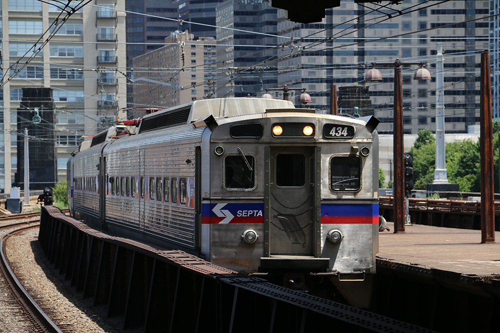 SEPTA regional rail train with buildings in the background