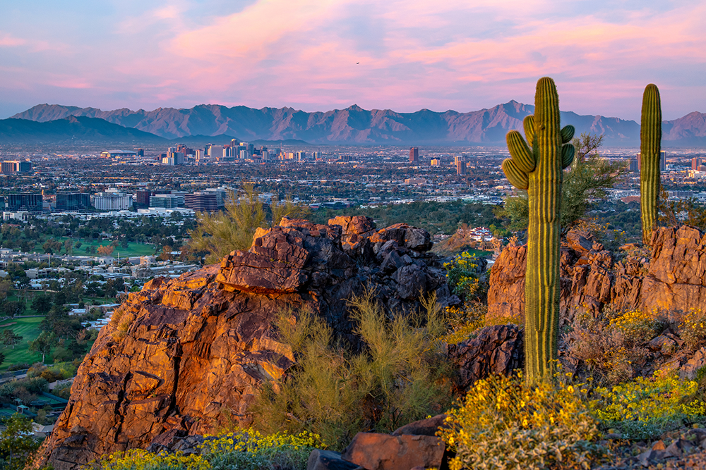 A view of the cities in metro Phoenix with mountains in the distance. Credit Visit Phoenix