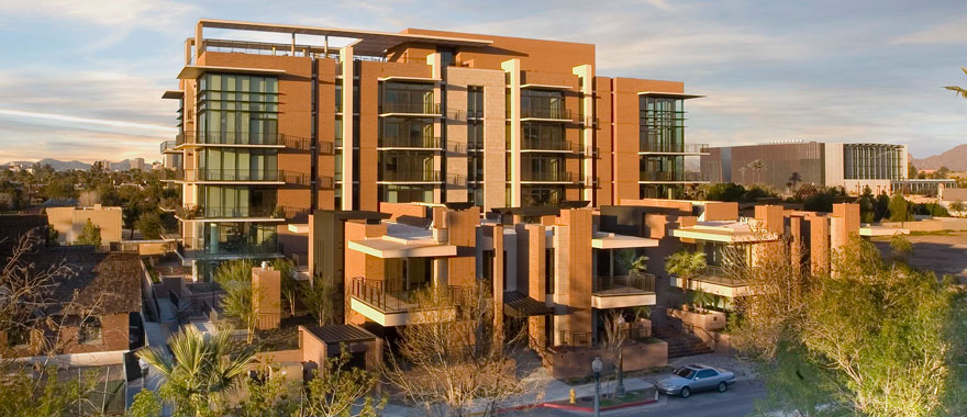 Portland Place condominiums in Phoenix, designed in soft desert colors with many ledges and windows. Developed by Habitat Metro