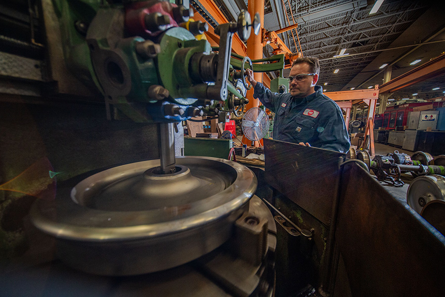 RideRTA employee working on a train wheel. Credit Greater Cleveland Regional Transit Authority